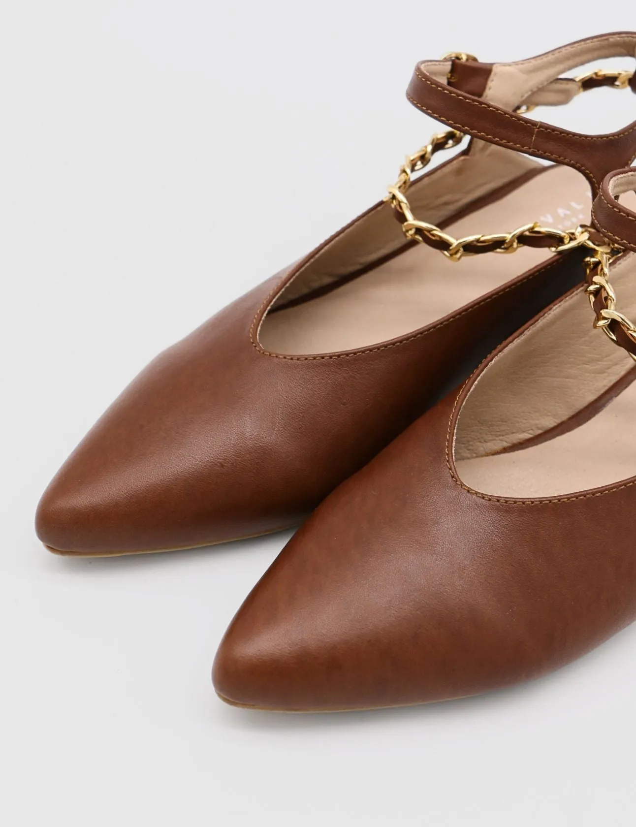 Selene gold chain slip on mule in tan leather