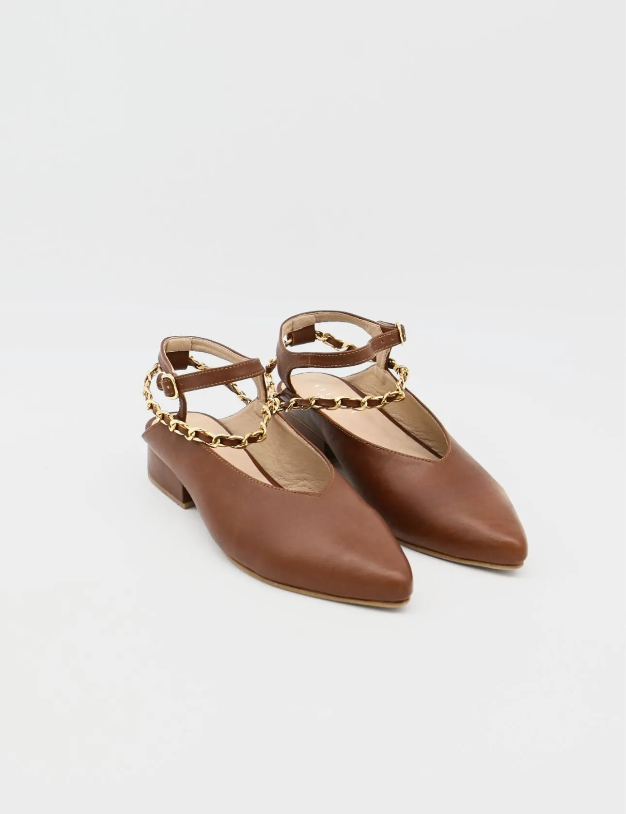 Selene gold chain slip on mule in tan leather